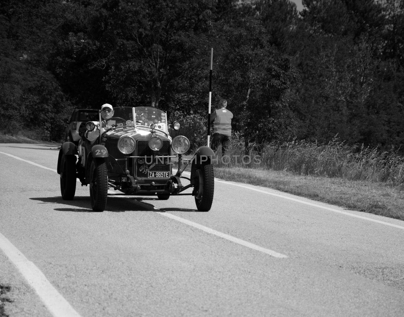 URBINO - ITALY - JUN 16 - 2022 : ALFA ROMEO 6C 1500 SS MM 1928 on an old racing car in rally Mille Miglia 2022 the famous italian historical race (1927-1957