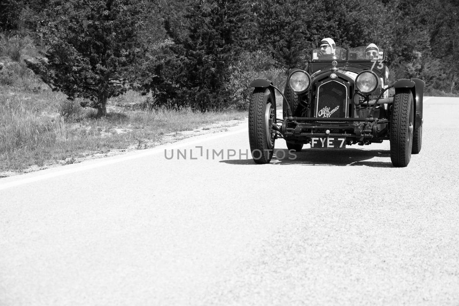 URBINO - ITALY - JUN 16 - 2022 : ALFA ROMEO 8C 2300 MONZA 1933 on an old racing car in rally Mille Miglia 2022 the famous italian historical race (1927-1957
