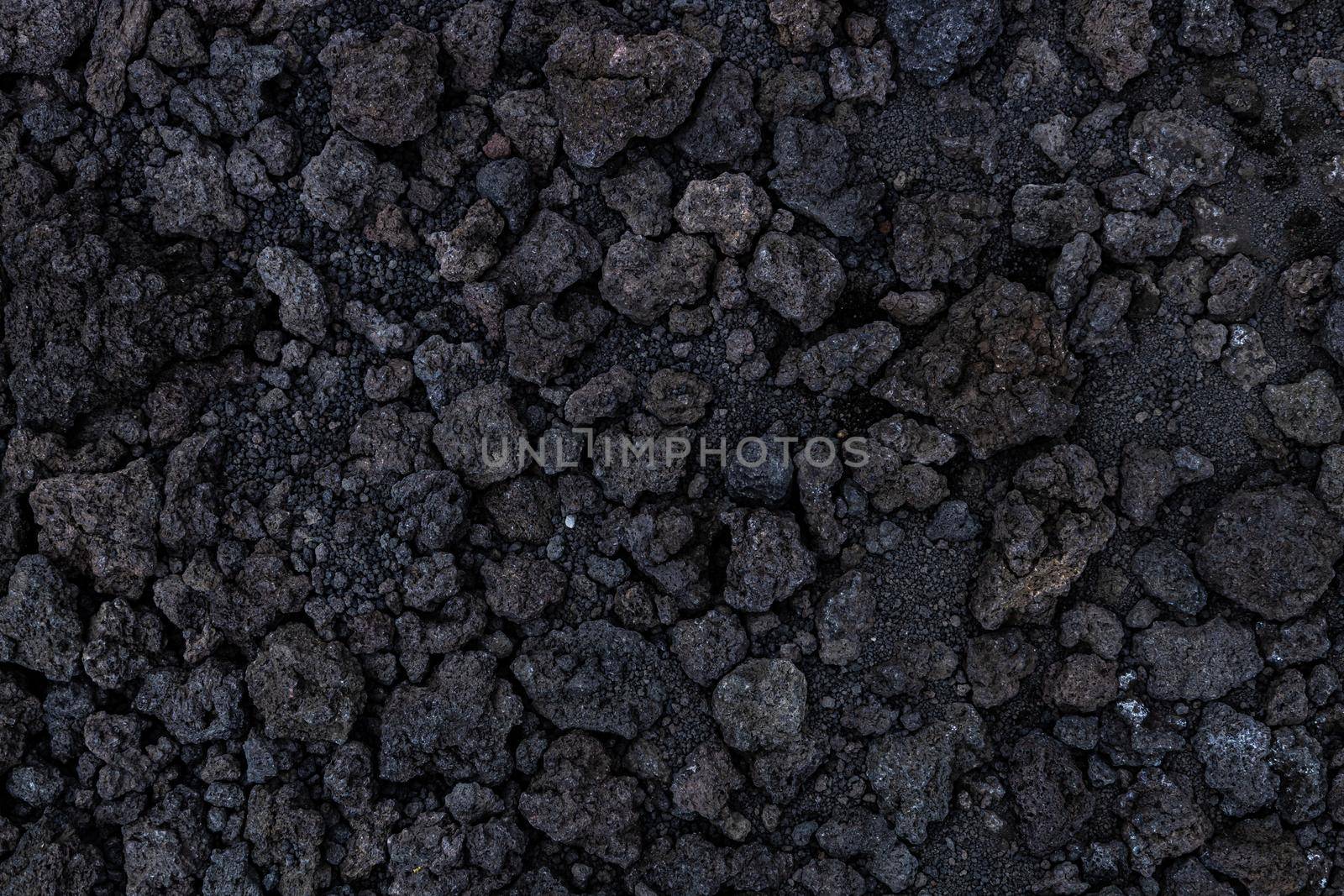 Background texture from volcanic lava stones. Volcanic rock from Etna, Sicily, Italy. High-quality photo