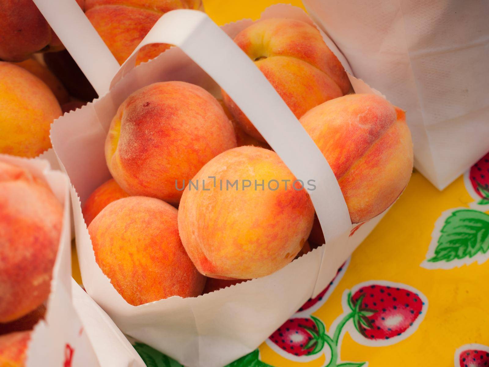 Peaches for sale at a farmer's market.