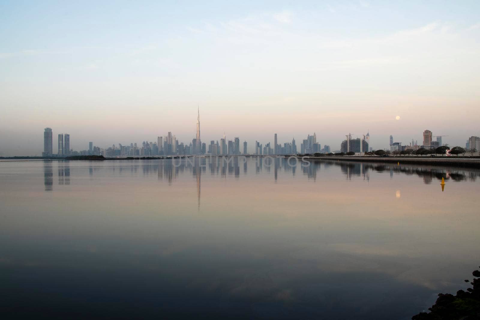 Dubai, UAE - 01.29.2021 Sunrise over Dubai city skyline.Outdoors by pazemin