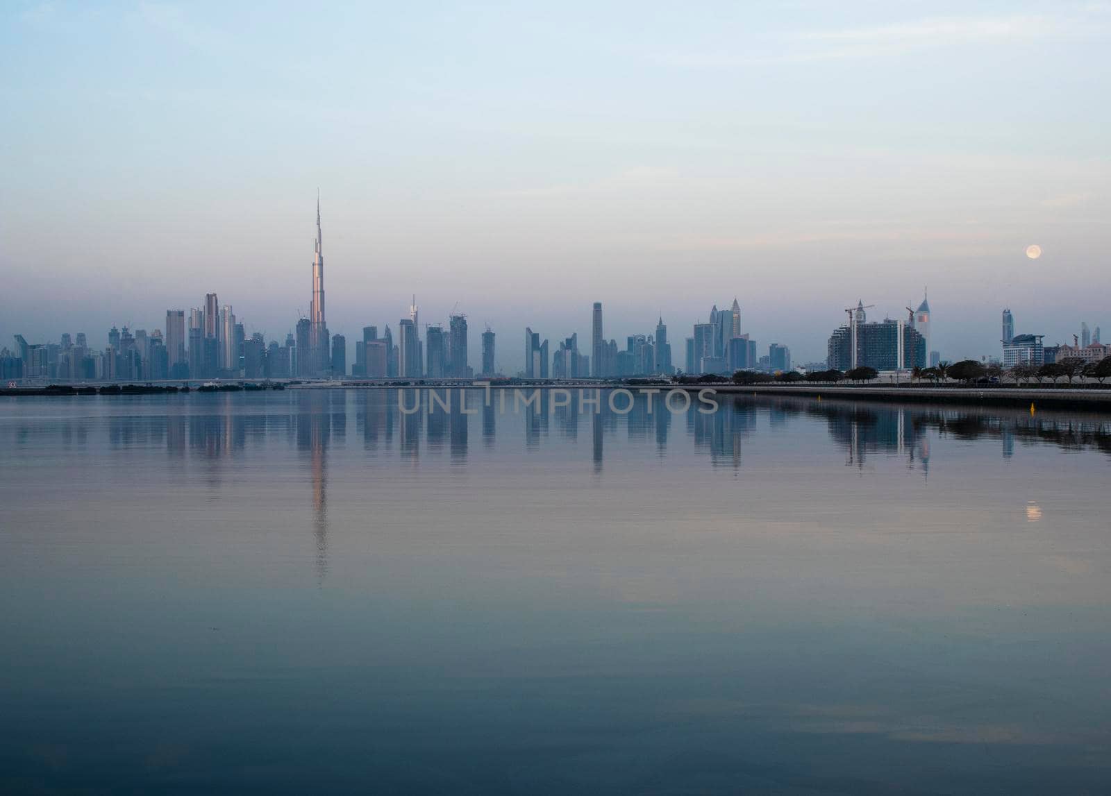 Dubai, UAE - 01.29.2021 Sunrise over Dubai city skyline.Outdoors by pazemin