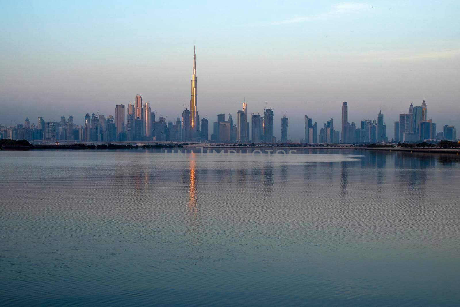 Dubai, UAE - 01.29.2021 Sunrise over Dubai city skyline.