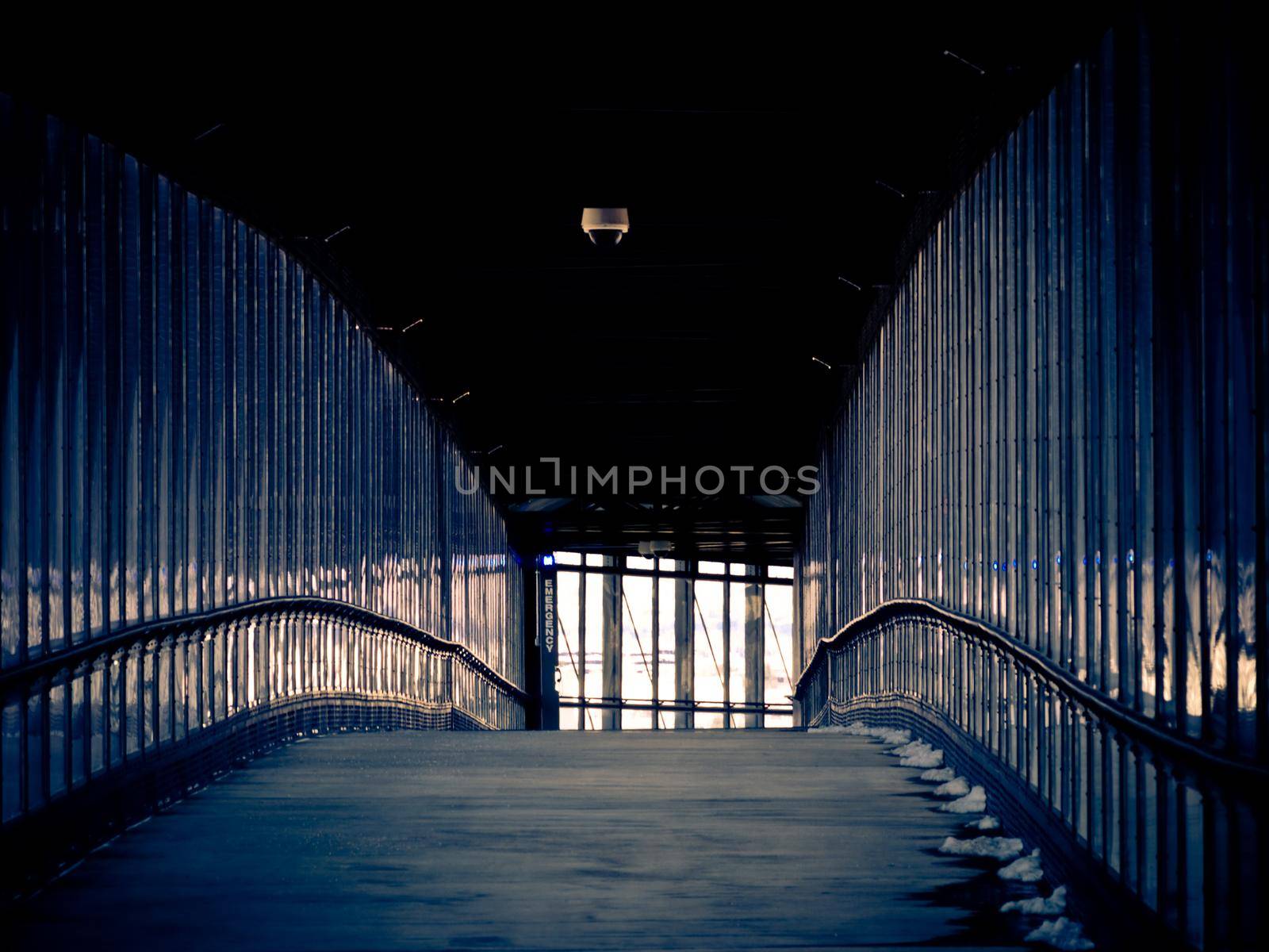 Bridge to the light rail stop over the highway.