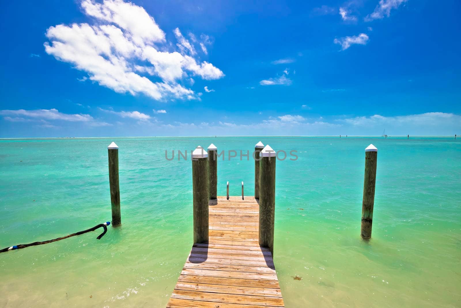 Idyllic turquoise bay and wooden dock in Islamorada on Florida Keys, Florida states of USA