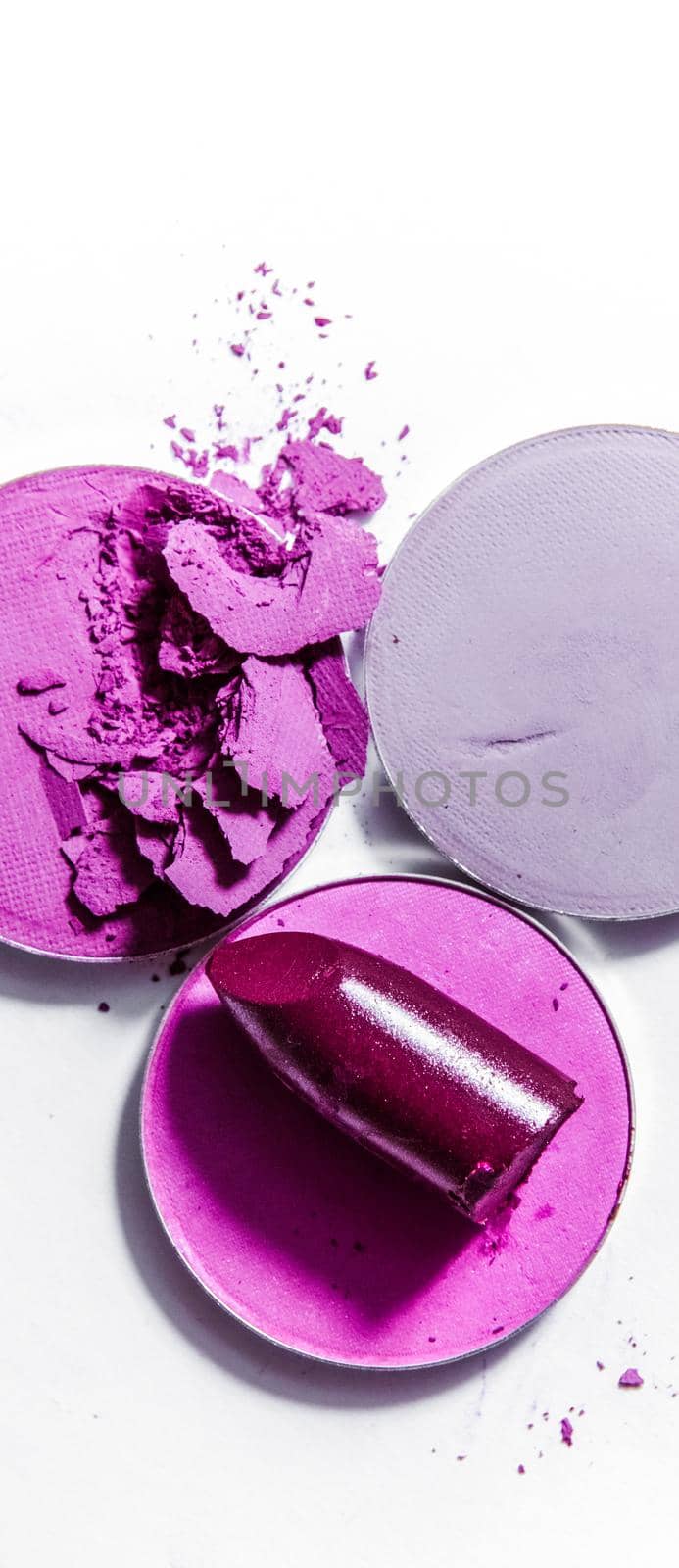 Beauty texture, cosmetic product and art of make-up concept - Crushed eyeshadows and lipstick isolated on white background