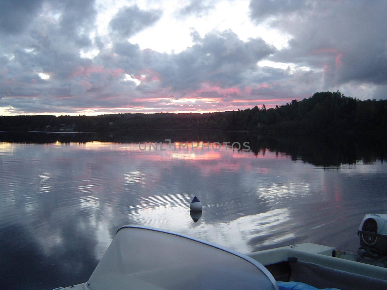 sunset over a lake in Algonquin provincial park, Ontario, Canada