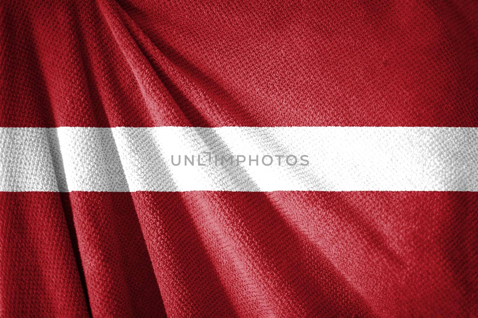 Latvia flag on towel surface illustration  by xbrchx