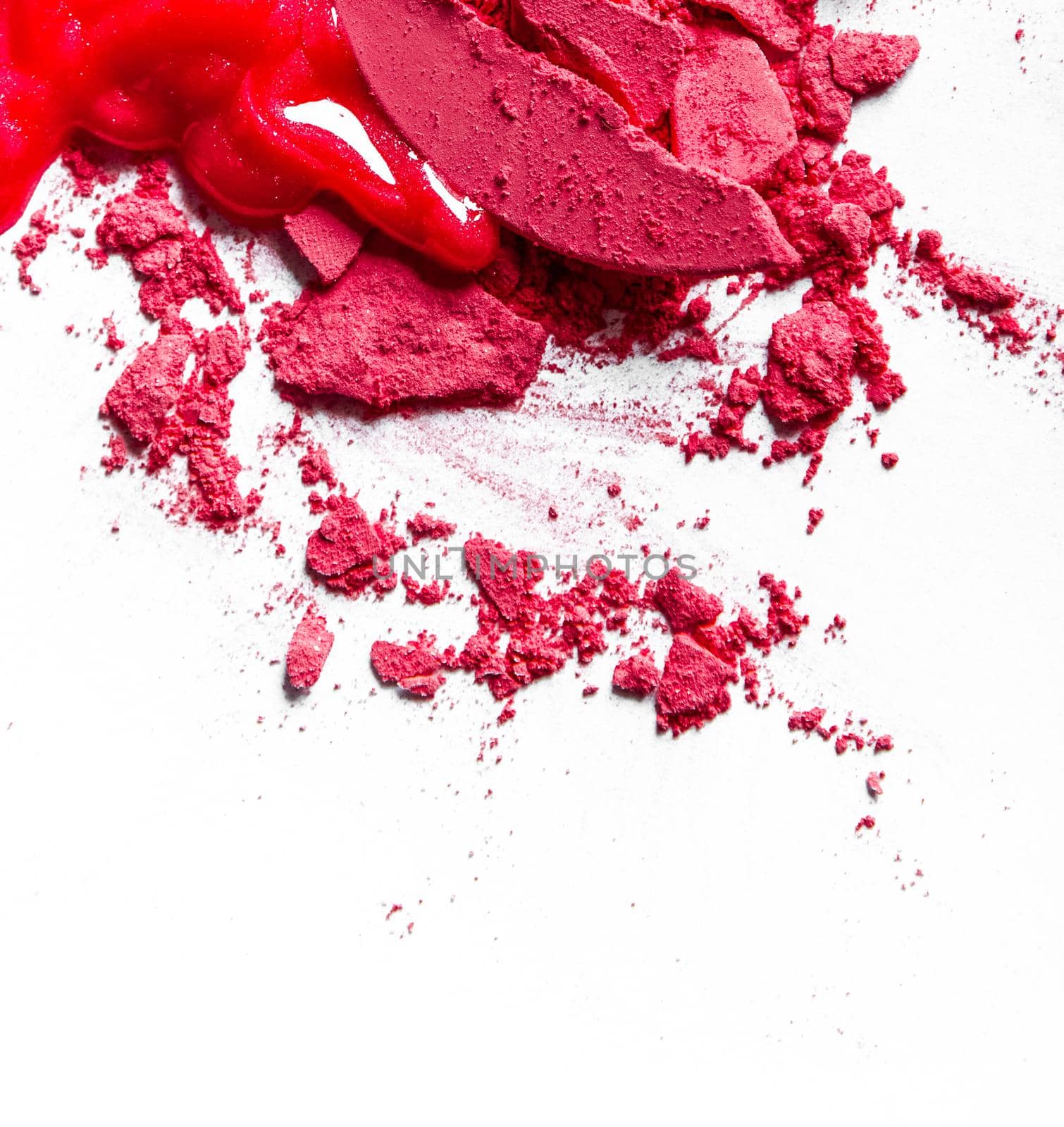 Beauty texture, cosmetic product and art of make-up concept - Crushed eyeshadows, lipstick and powder isolated on white background