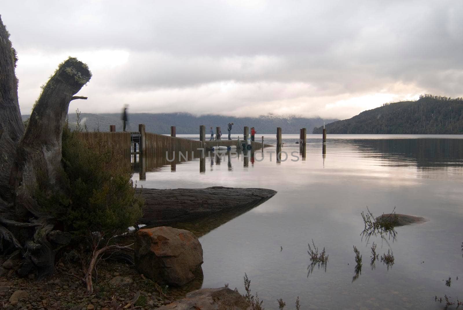 dusk with low hanging cloud at lake st clair, tasmania