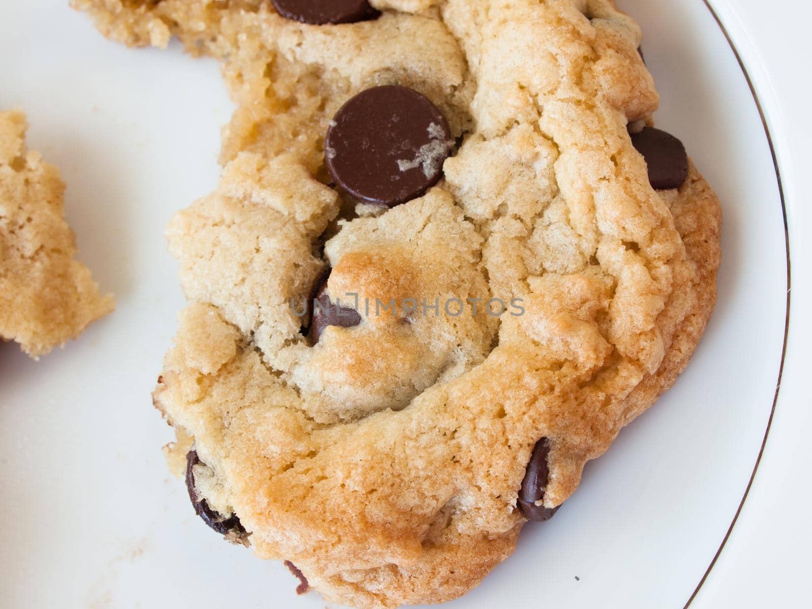 Broken homemade chocolate chip cookies.