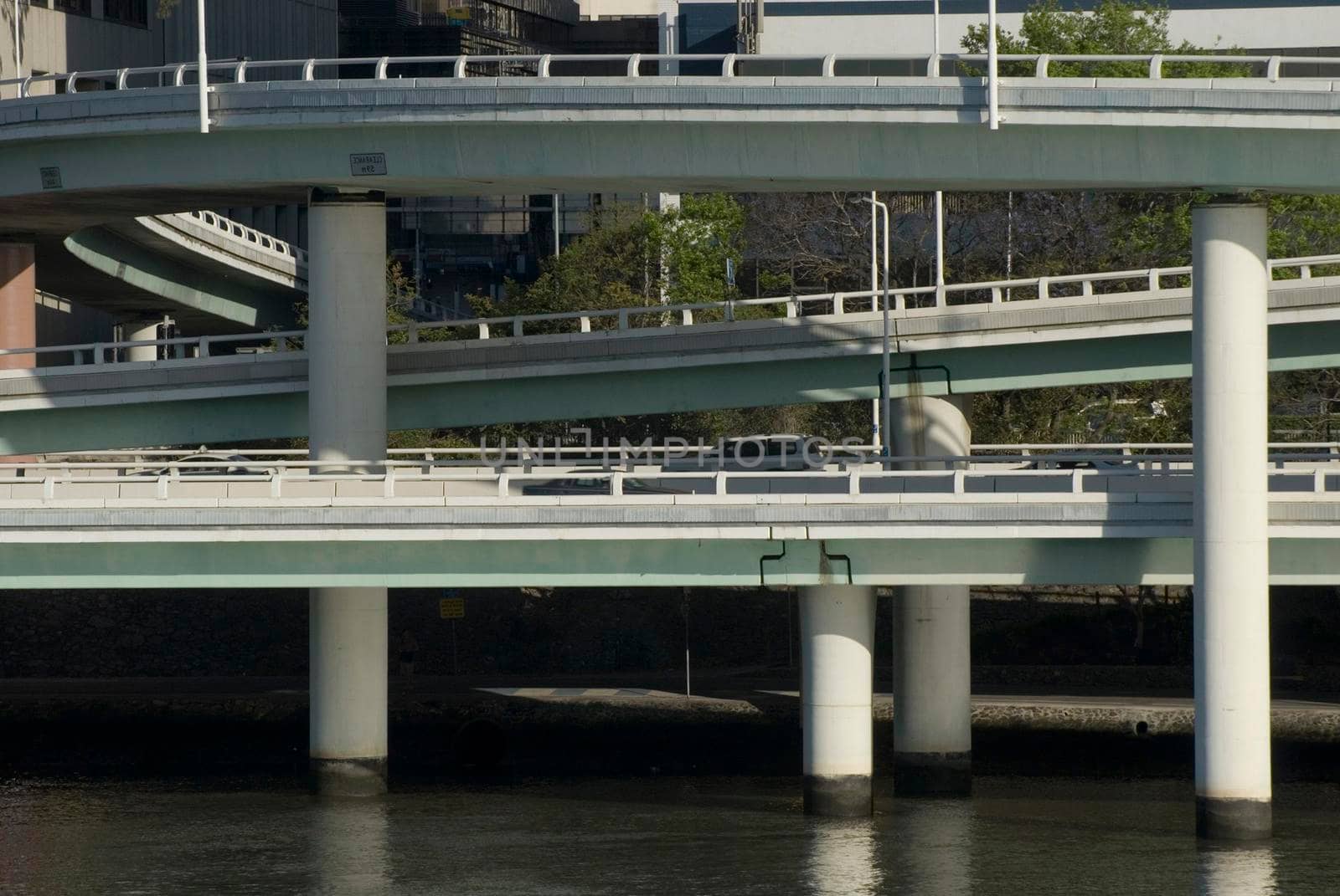 System of elevated motorways carrying vehicular traffic causing air pollution through exhaust emissions