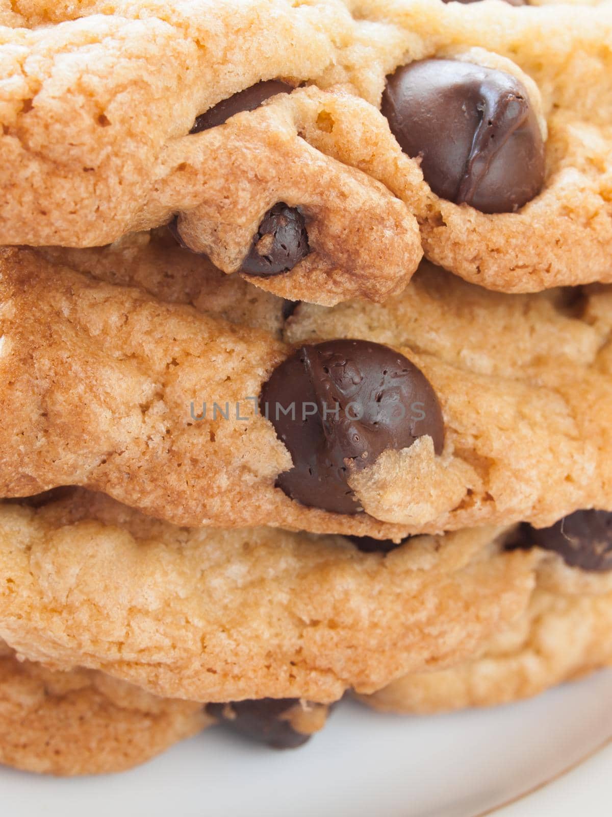 Stack of homemade chocolate chip cookies.