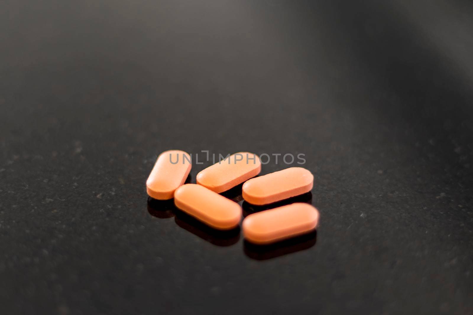 Close up shot of a an oval shaped tablets