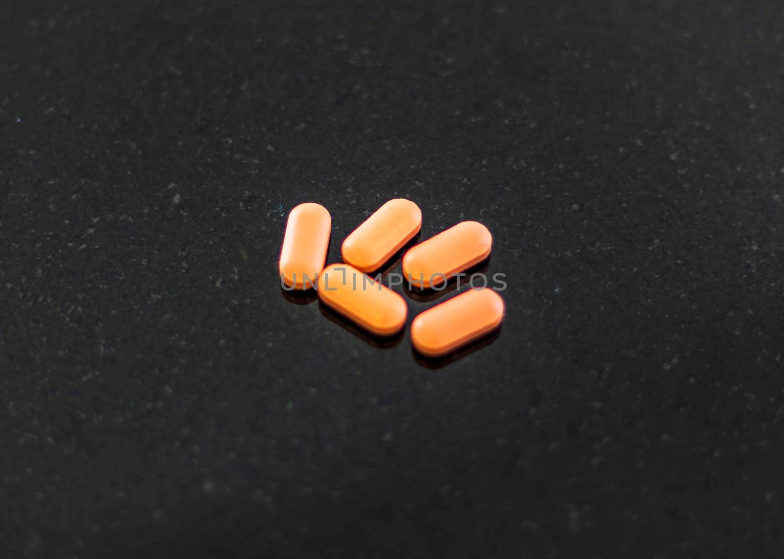 Close up shot of a an oval shaped tablets