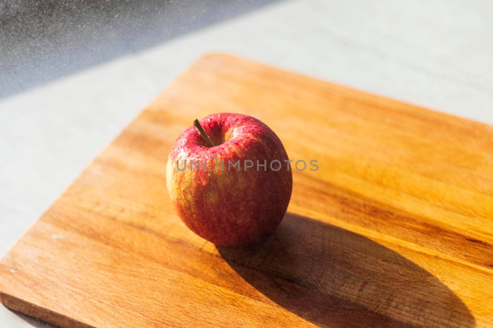 Close up shot of an apple and water droplets in it. Food by pazemin