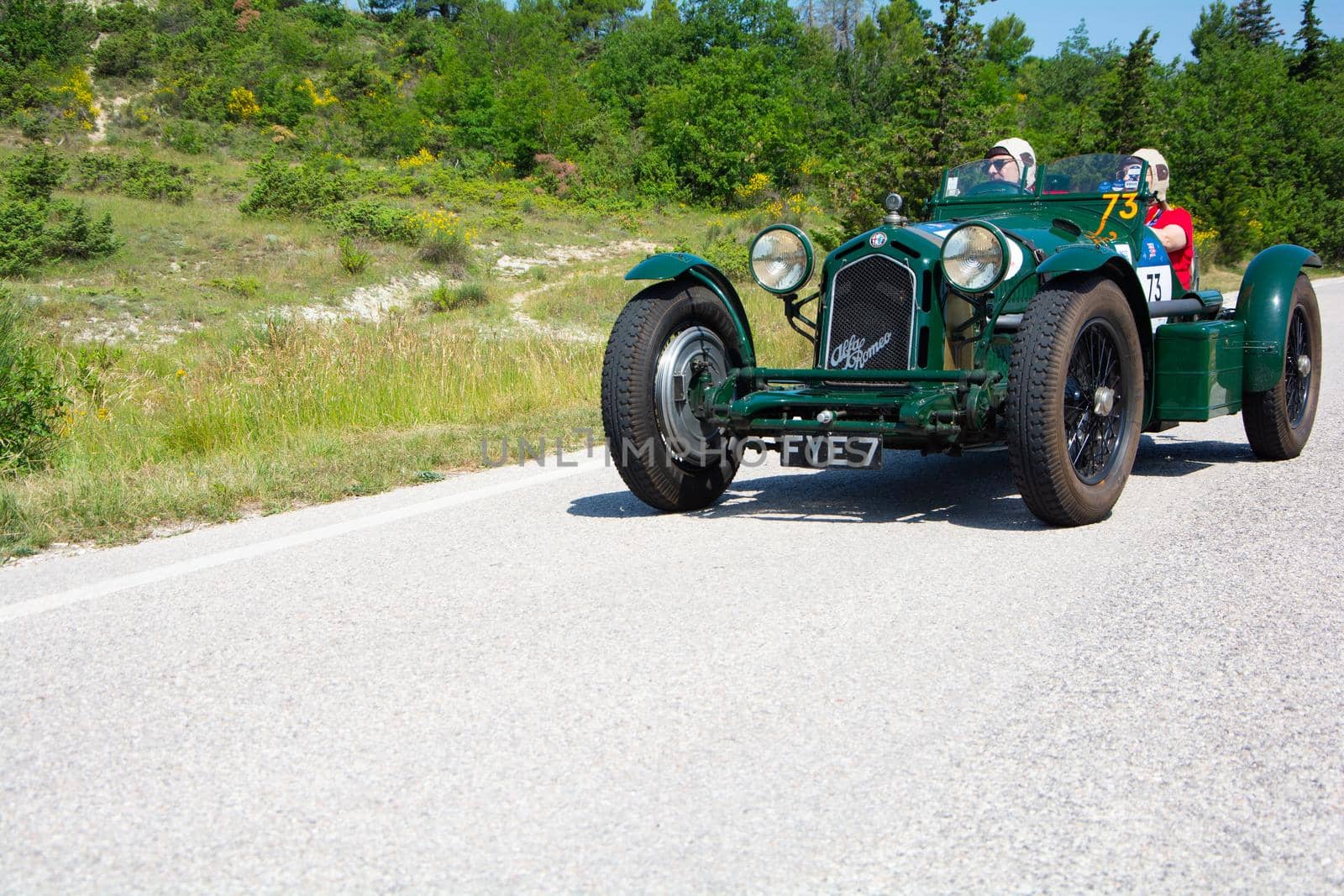 URBINO - ITALY - JUN 16 - 2022 : ALFA ROMEO 8C 2300 MONZA 1933 on an old racing car in rally Mille Miglia 2022 the famous italian historical race (1927-1957