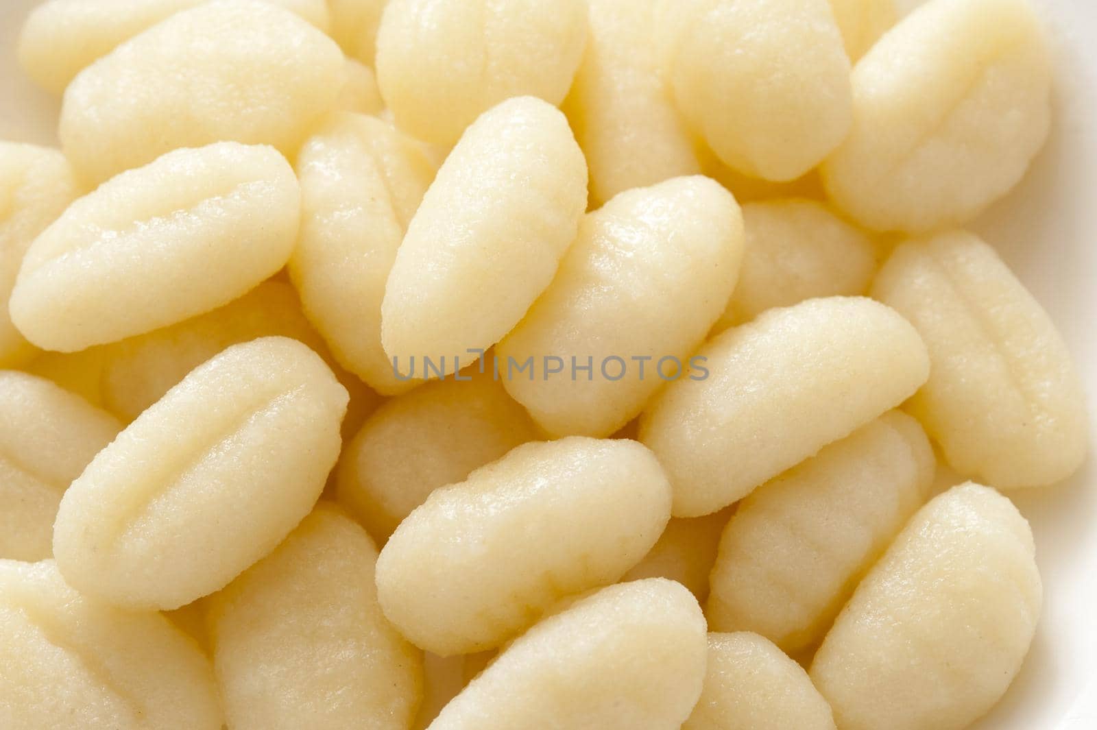 Pile of white freshly made Italian Gnocchi
