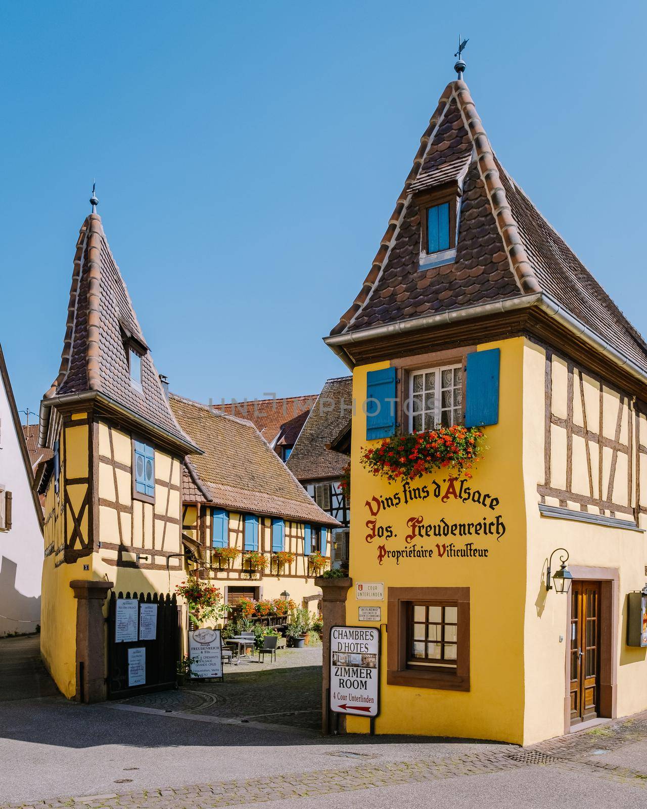 Eguisheim, Alsace, France,Traditional colorful halt-timbered houses in Eguisheim Old Town on Alsace Wine Route, France by fokkebok