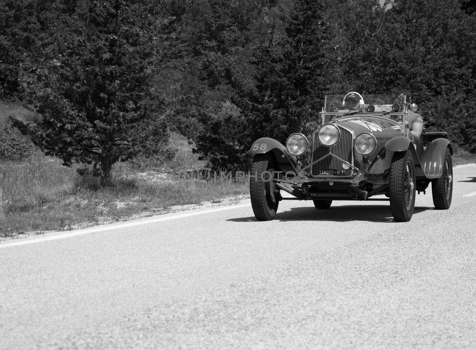 URBINO - ITALY - JUN 16 - 2022 : ALFA ROMEO 6C 1500 SUPER SPORT 1929 on an old racing car in rally Mille Miglia 2022 the famous italian historical race (1927-1957