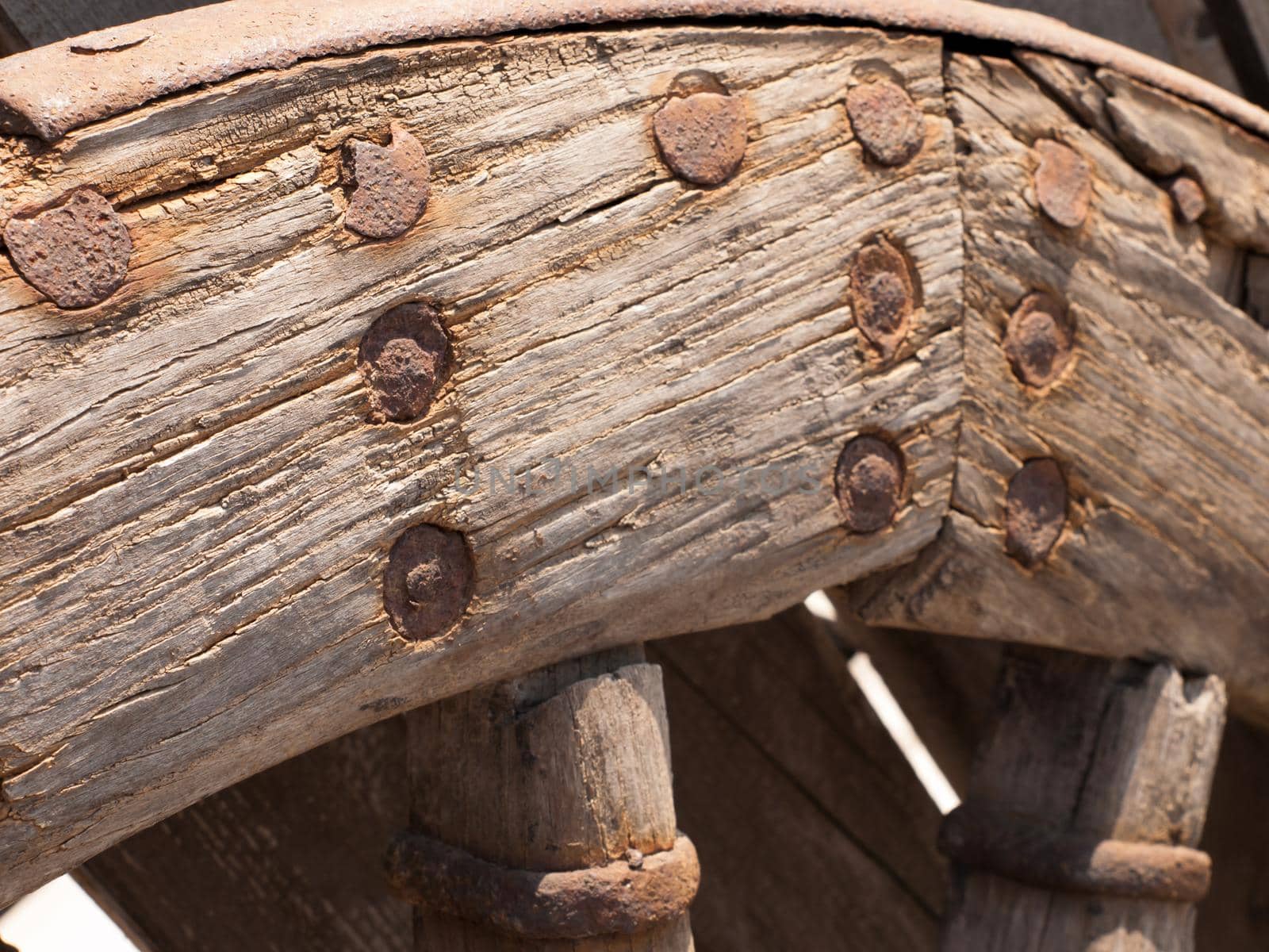 Old wooden wheel by arinahabich