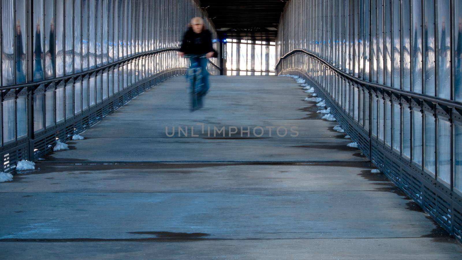 Bridge to the light rail stop over the highway.