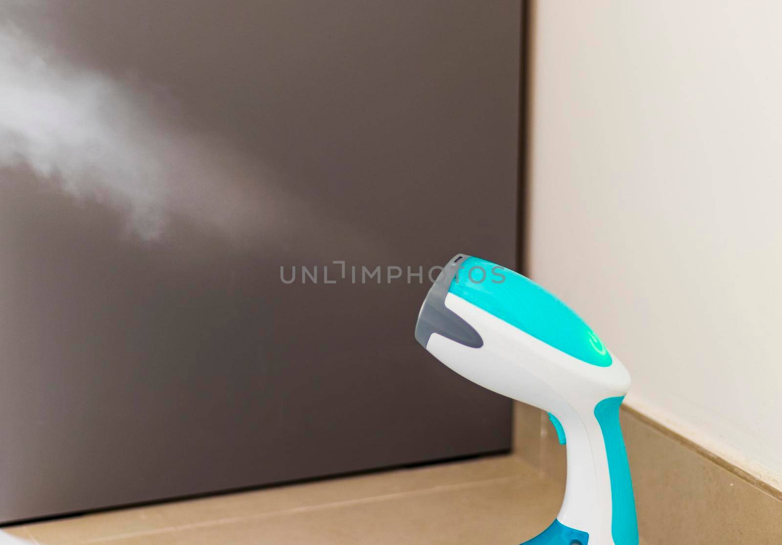 Close up shot of a steam iron.
