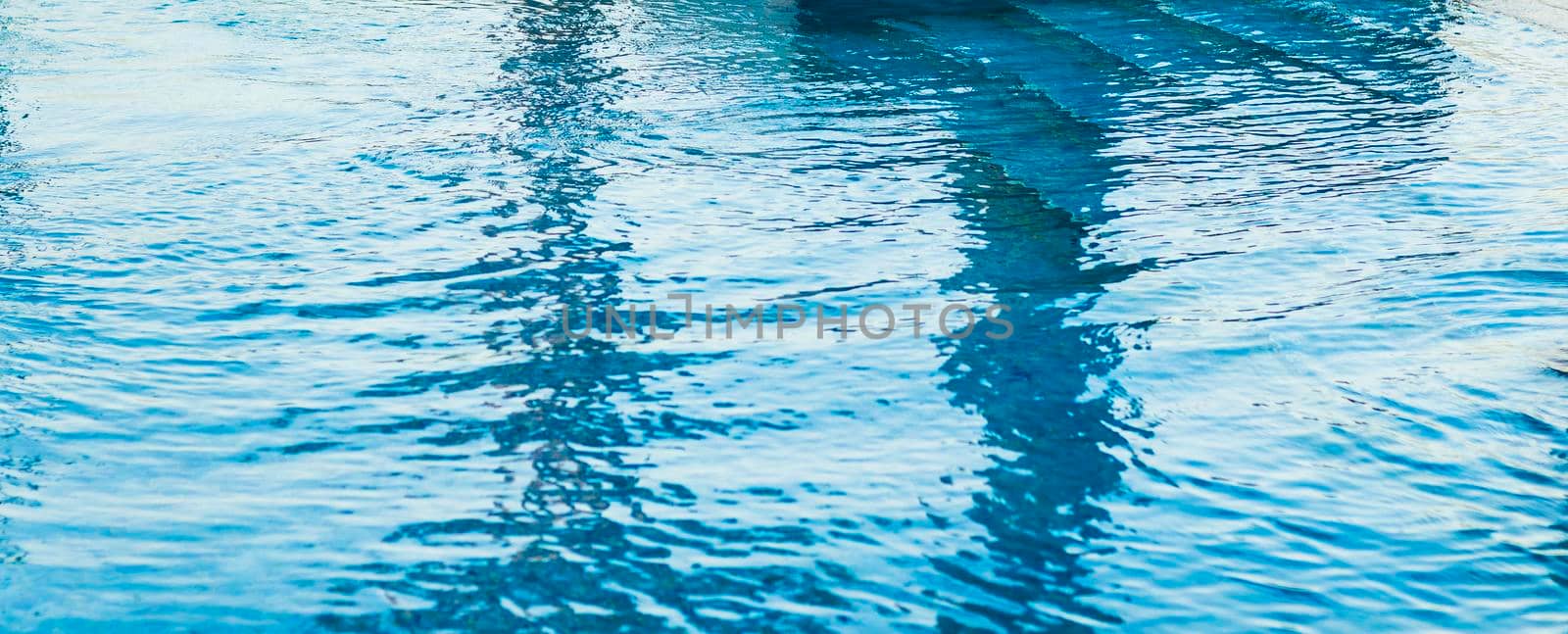 Shot of a blue water in the pool