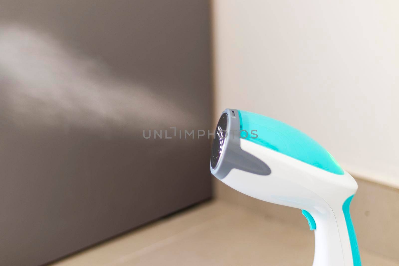Close up shot of a steam iron.