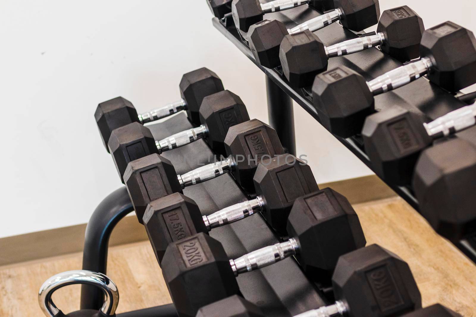 Close up shot of various gym equipment and weights. Fitness by pazemin