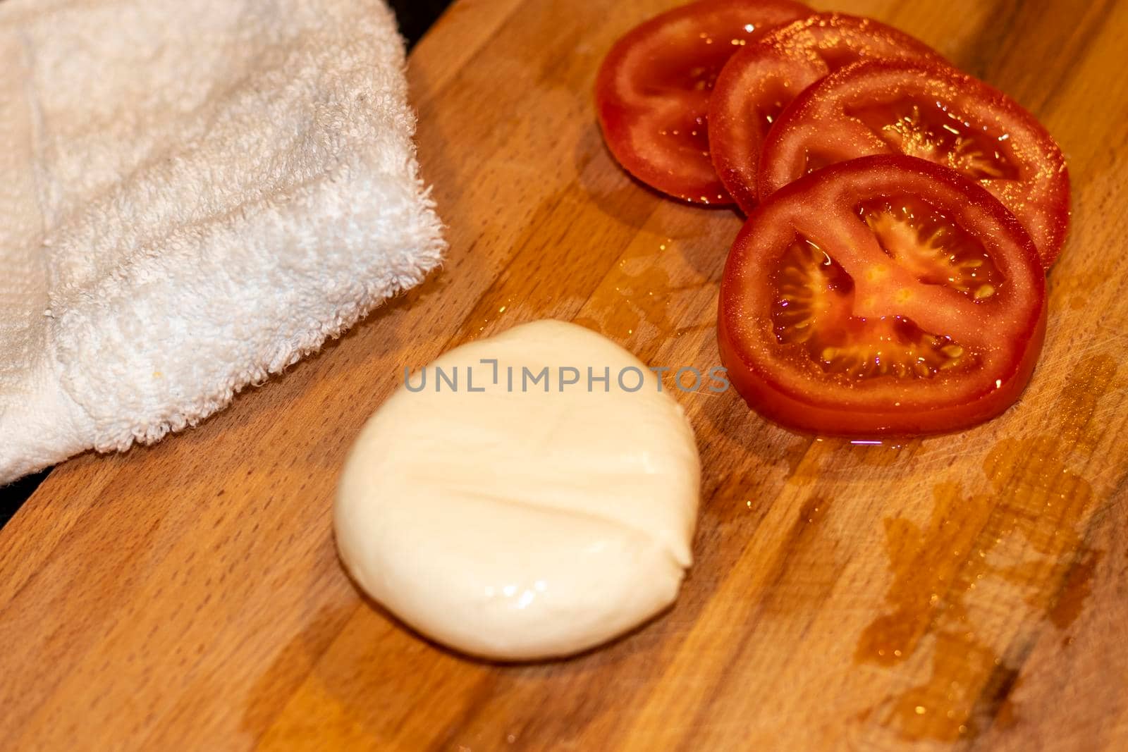 Food photography. Mozzarella cheese and tomatoes