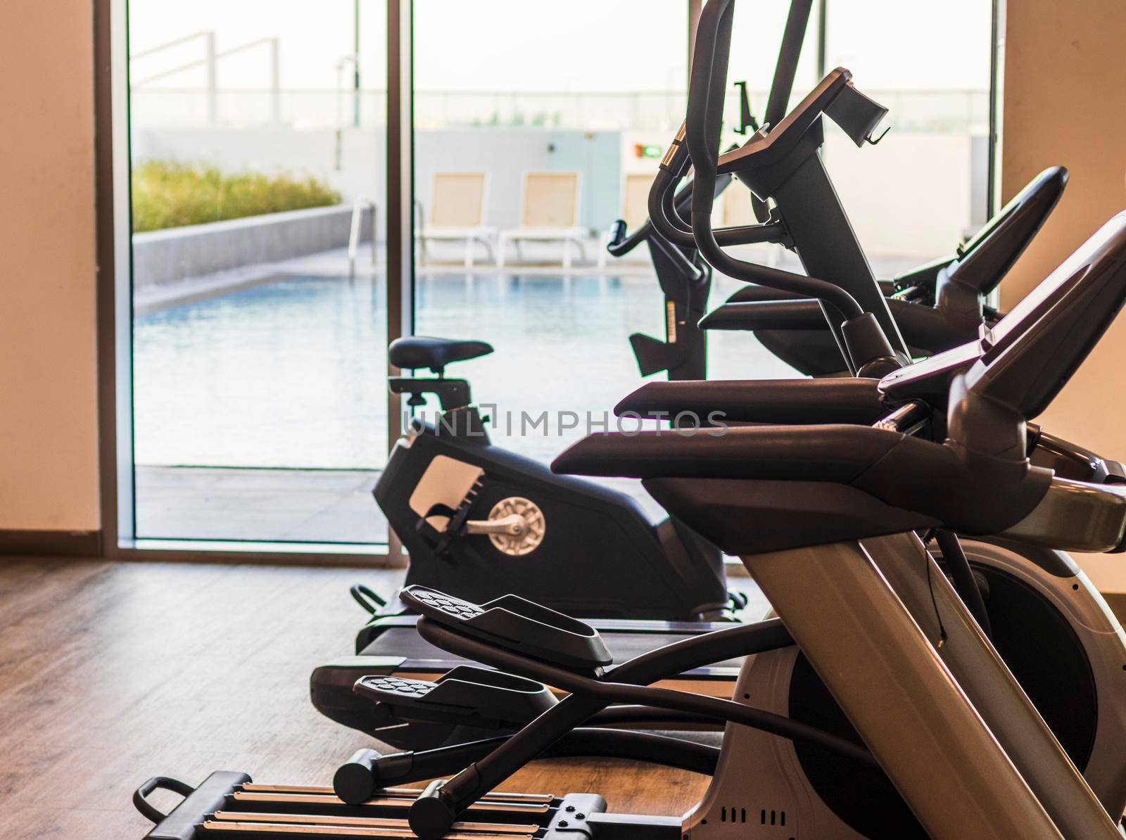 Close up shot of various gym equipment and weights. Fitness by pazemin