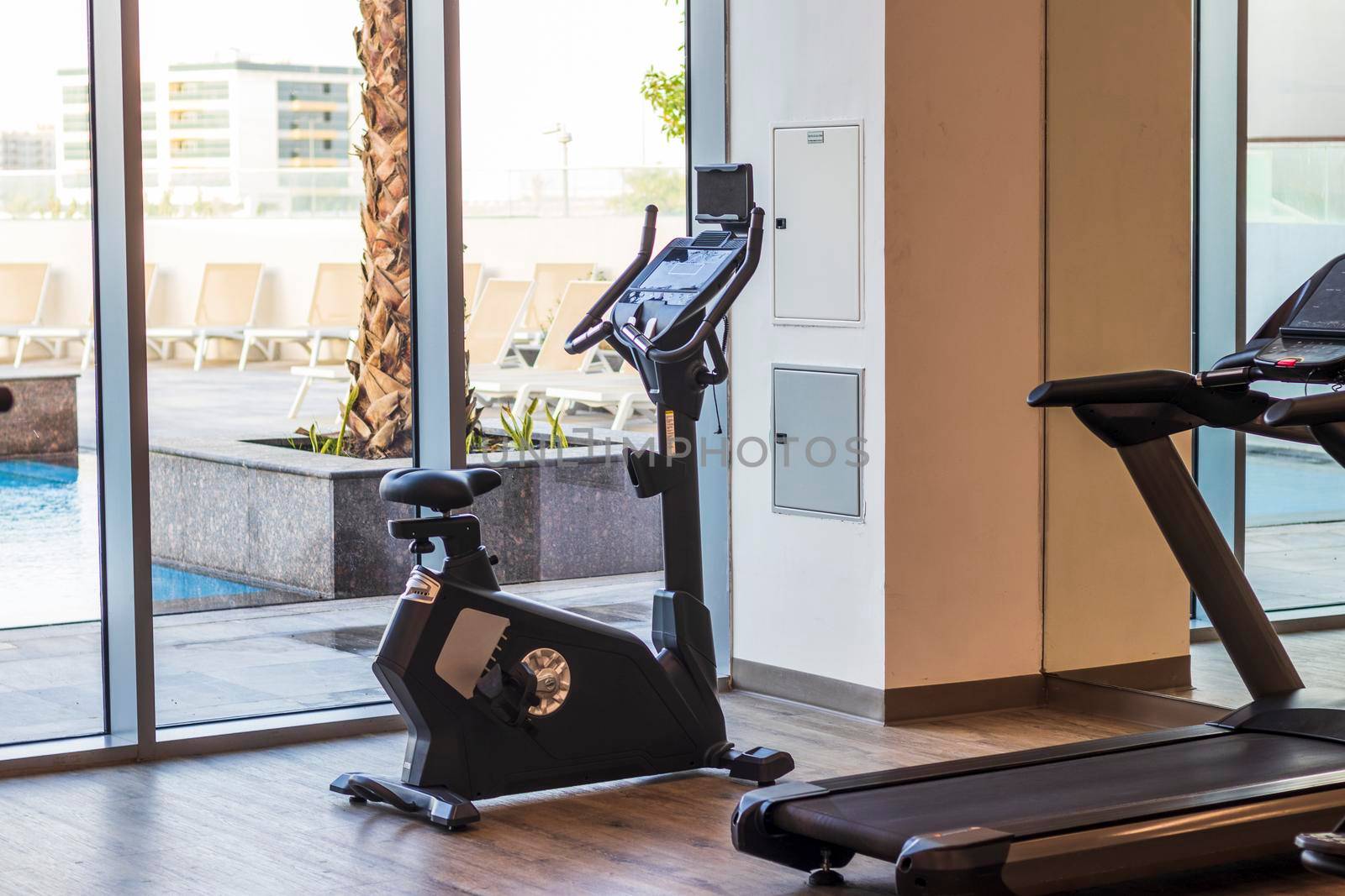 Close up shot of various gym equipment and weights.