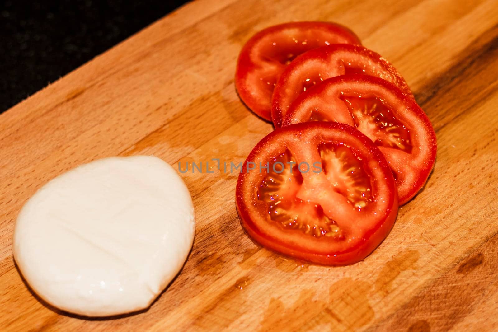 Food photography. Mozzarella cheese and tomatoes