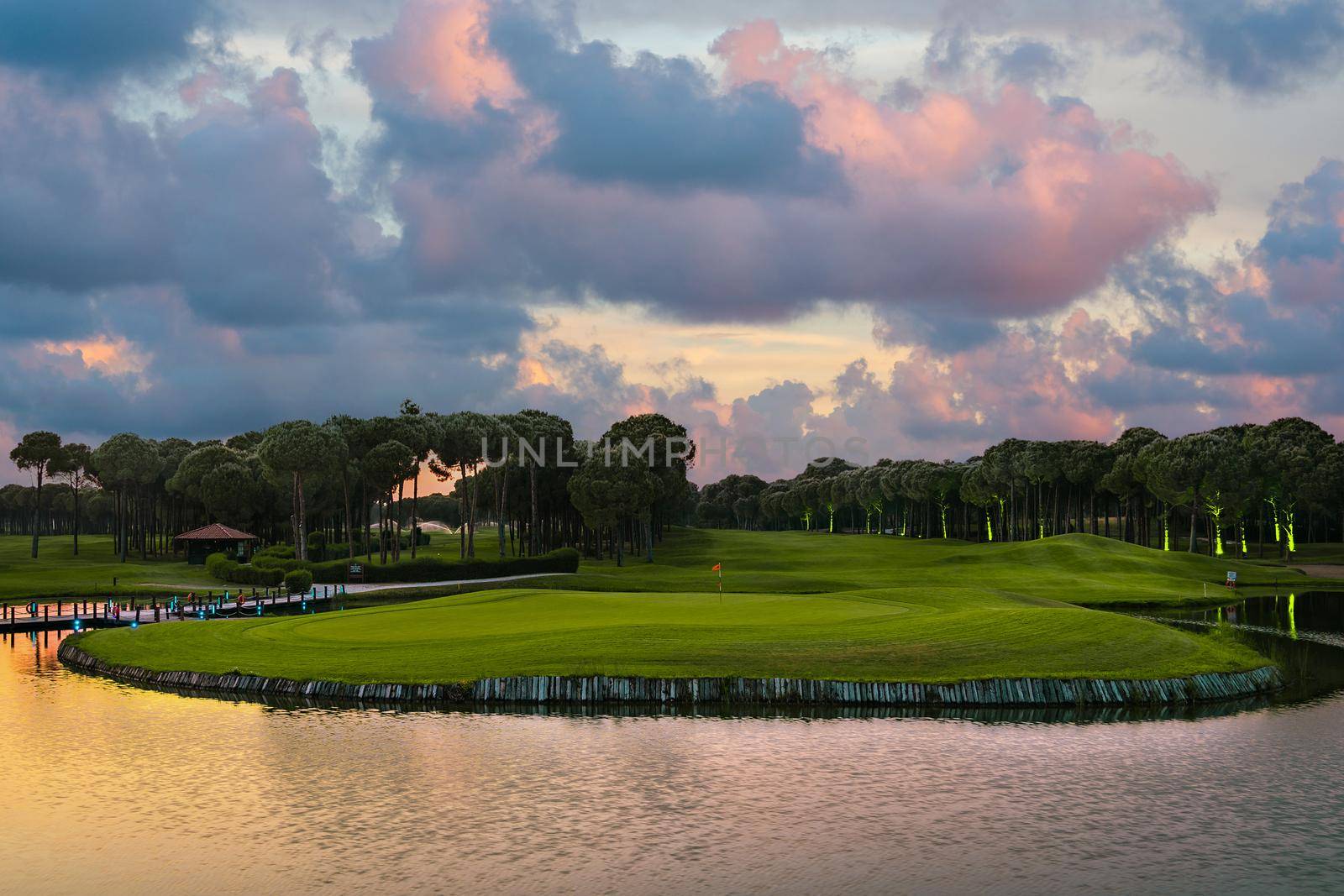 Landscape view of beautiful golf course at sunset in Turkey Belek