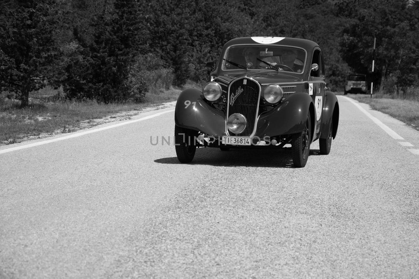 URBINO - ITALY - JUN 16 - 2022 : FIAT 508 S MM BALILLA BERLINETTA AERODINAMICA 1935 on an old racing car in rally Mille Miglia 2022 the famous italian historical race (1927-1957