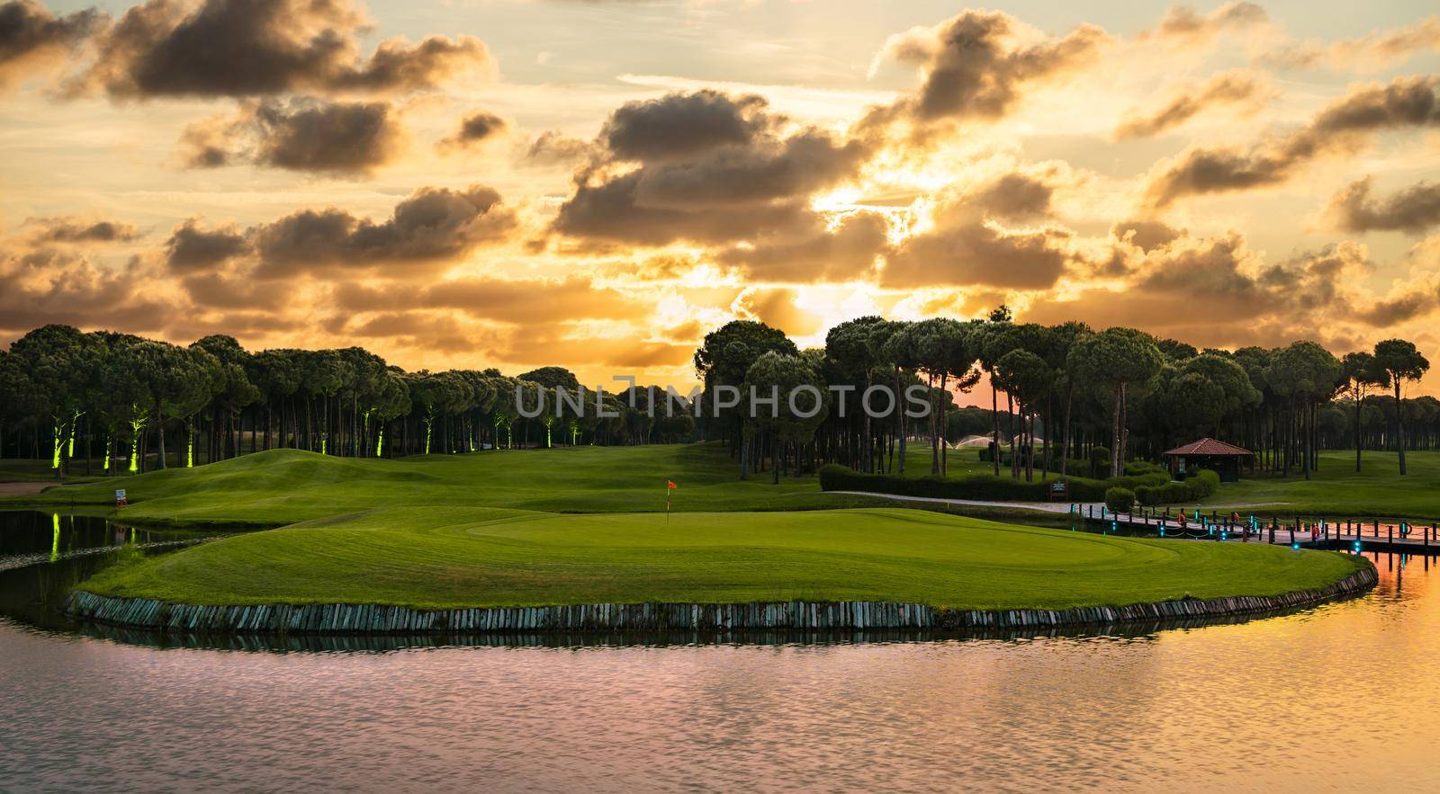 Landscape view of beautiful golf course at sunset in Turkey Belek