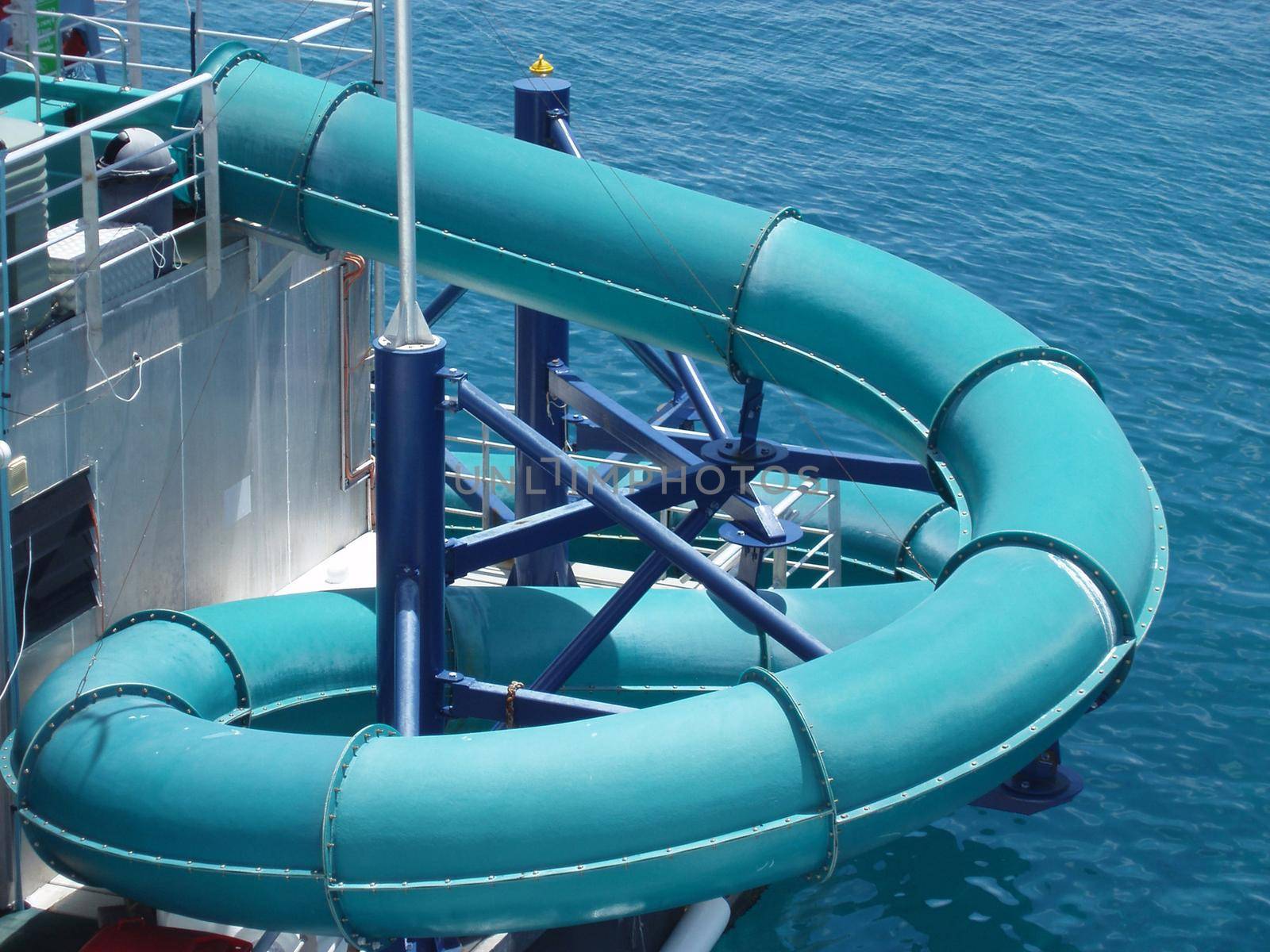 fun in the water, a blue snakeing waterchute