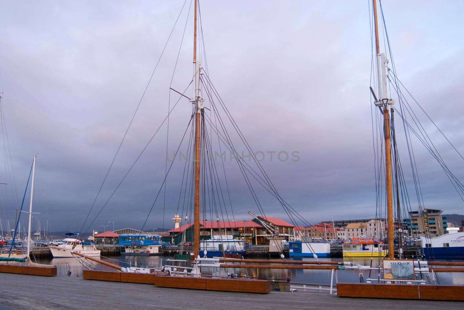 masts of a wooden boat berthed in constitution dock, hobart, tasmania