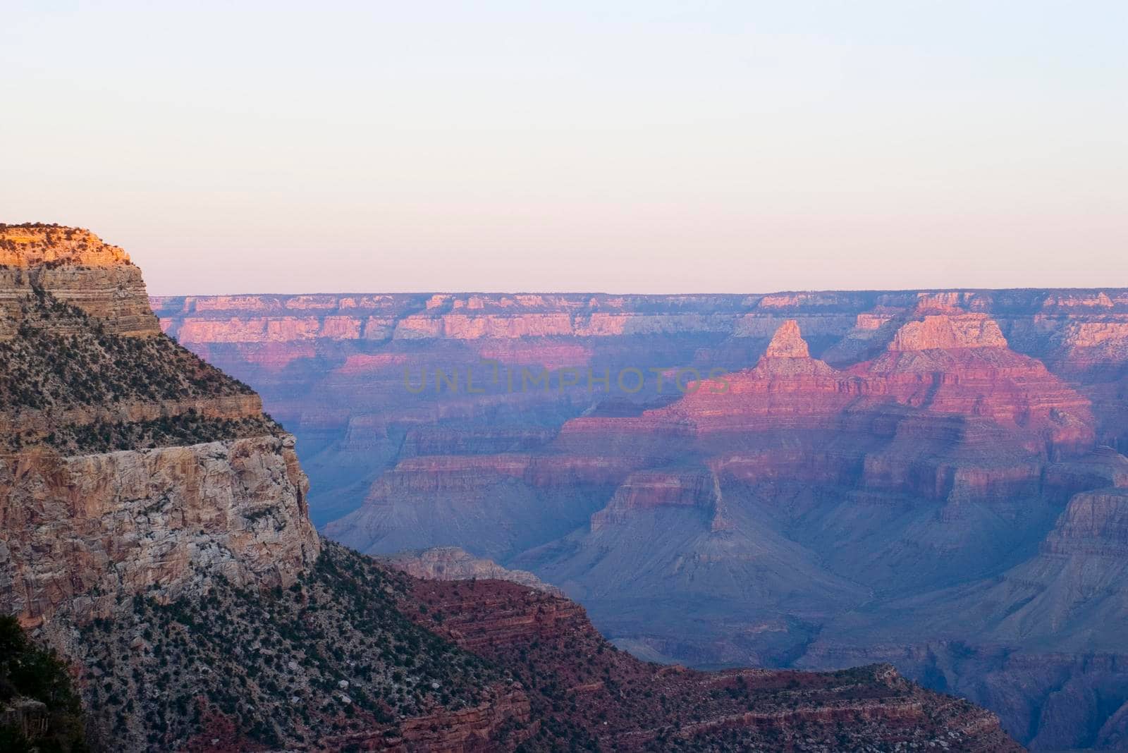 beautiful red and ornage layers lit by the setting sun over the grand canyon