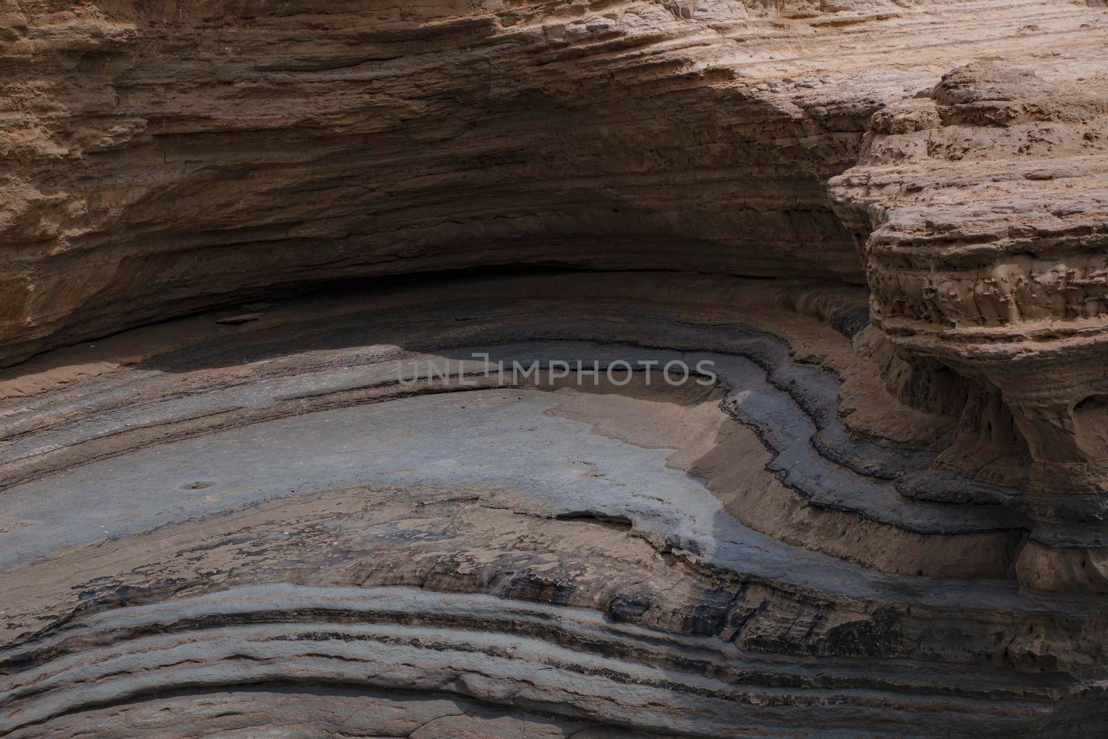 a mountain on the seashore in a section on the coast of Sidari on the island of Corfu in Greece by Costin