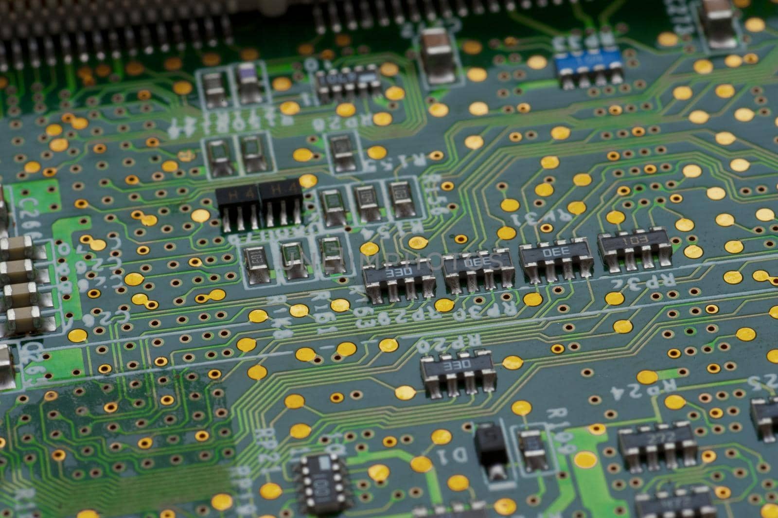 Closeup of printed electronic computer motherboard and microchips