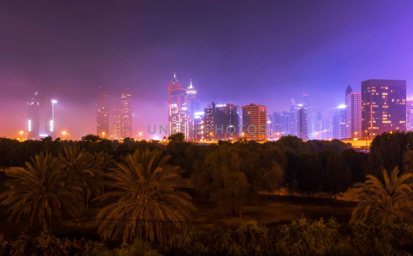 Dubai, UAE - 06.04.2021 Business bay district at night. Urban by pazemin