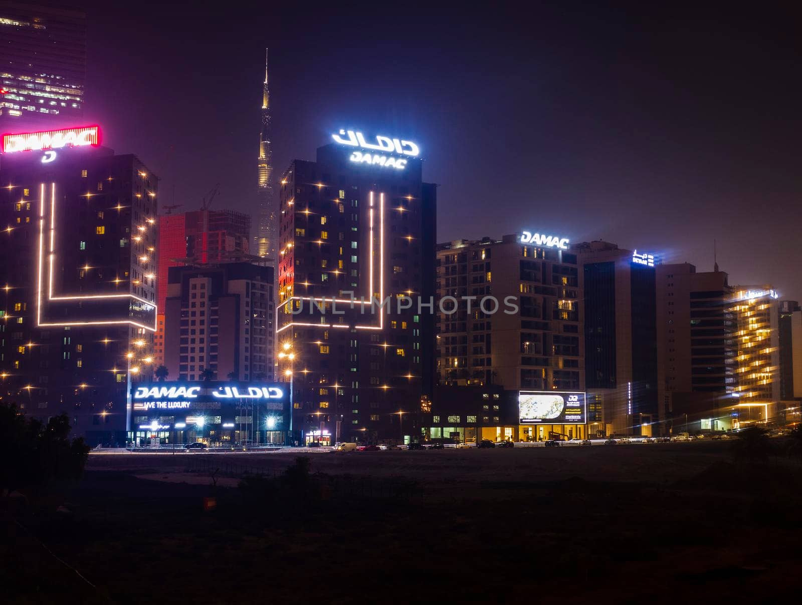 Dubai, UAE - 06.04.2021 Business bay district at night. Urban by pazemin