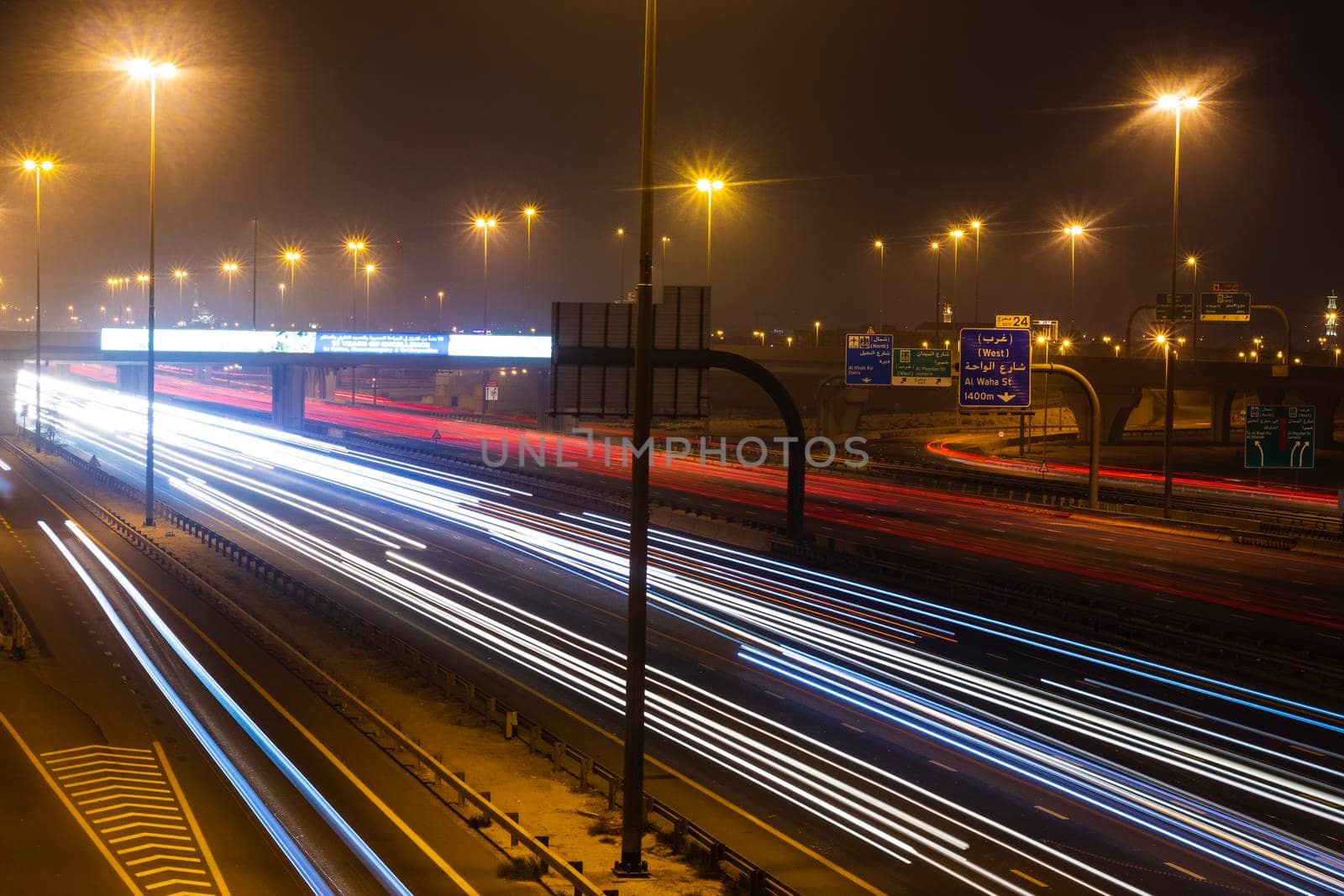Dubai, UAE - 06.04.2021 Light trails on Al Khail road at night