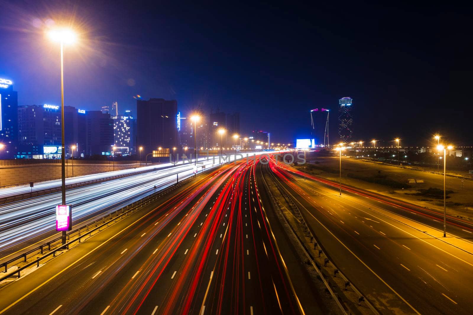 Dubai, UAE - 06.04.2021 Light trails on Al Khail road at night