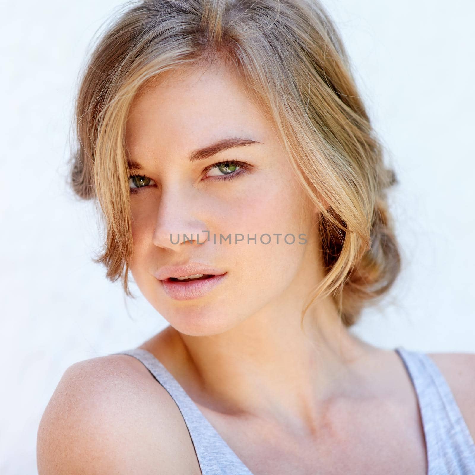 The best accessory a girl can own is confidence. A fashionable young woman posing outdoors