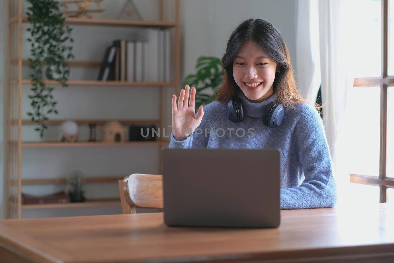 Asian girl student online learning class study online video call zoom teacher, Happy asian girl learn english language online with computer laptop..