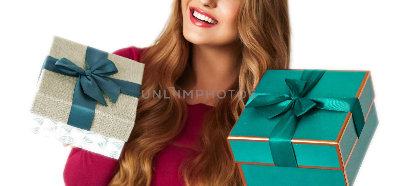 Birthday, Christmas gifts or holiday present, happy woman holding gift boxes isolated on white background, portrait