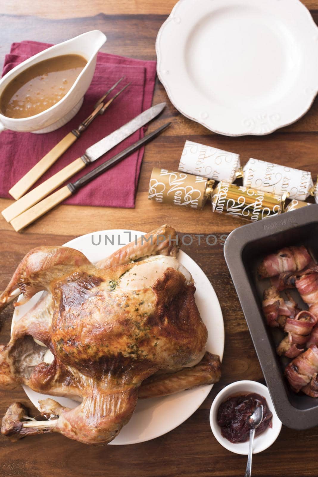 Thanksgiving turkey with side dishes served on table